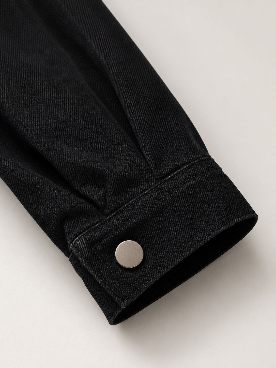 The Cropped Denim Jacket Black_sleeve_detail_with_metal_snap